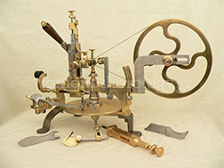 Restoration or reconstruction of Swiss wheel cutting engine with its accessories